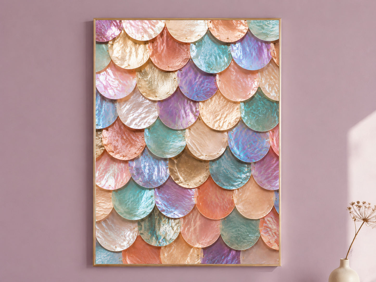 Framed rainbow iridescent mermaid scale wall art with coral, lavender, and teal, styled on a dusty mauve wall