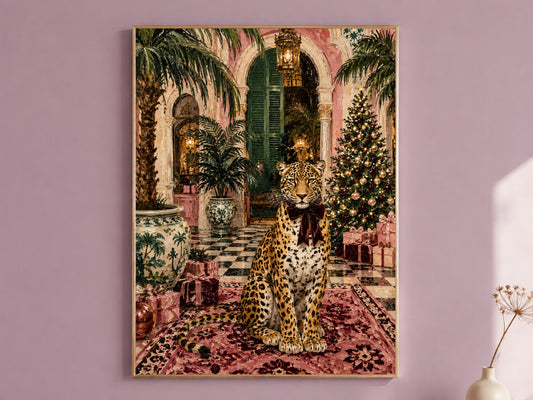 Leopard Christmas wall art print of a pink palazzo scene framed in gold, hung on a dusty mauve wall