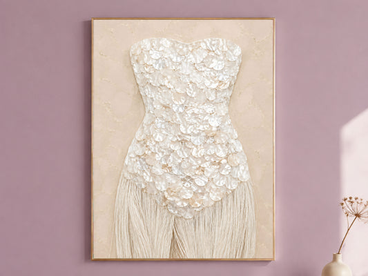 Ivory mother of pearl wall art print, framed against a mauve wall.