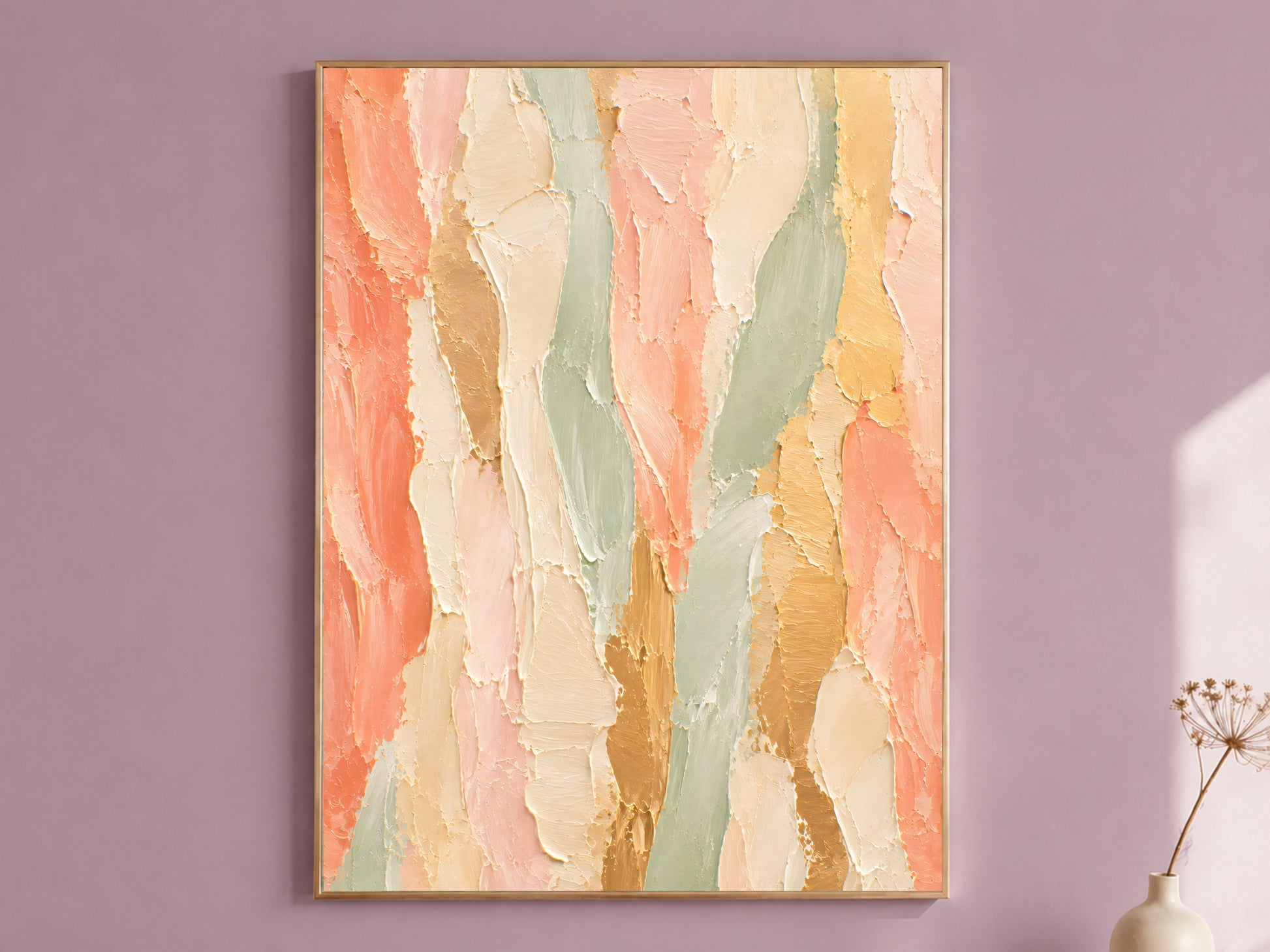 Framed coral, sage green, and gold textured impasto abstract painting print hanging on a dusty mauve wall
