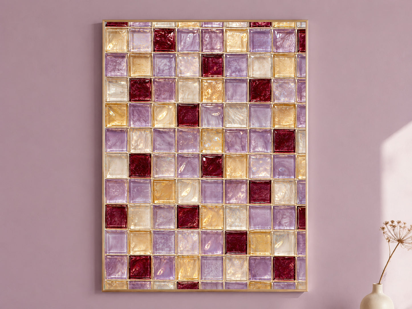 Framed purple, gold, and burgundy mosaic tile pattern wall art print hanging on a mauve wall