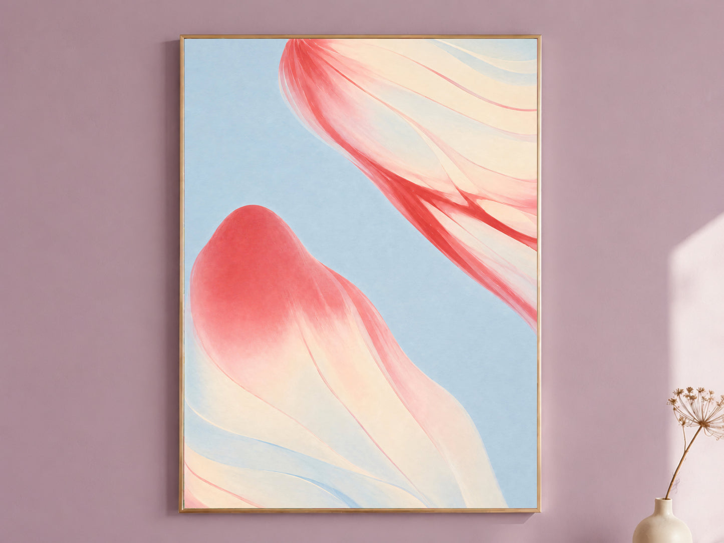 Coral and blue abstract art in gold frame on mauve wall, modern macro petal print