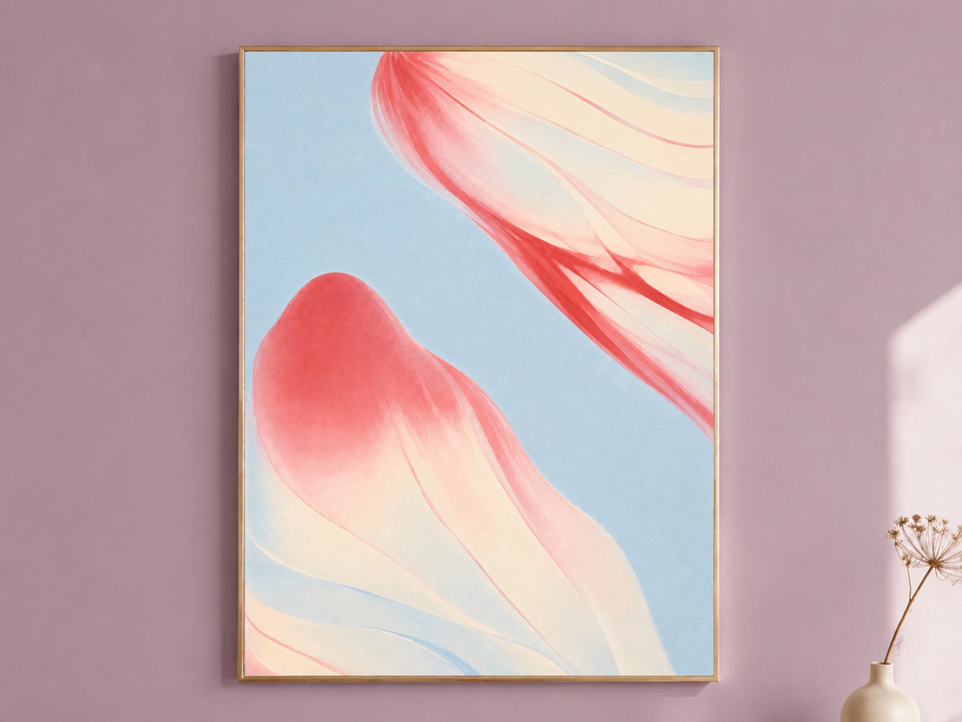 Coral and blue abstract art in gold frame on mauve wall, modern macro petal print