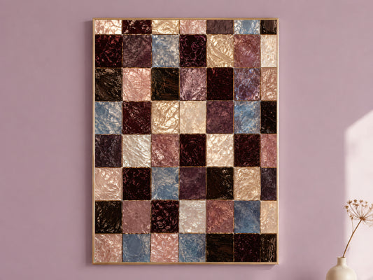 Moody mosaic wall art print of a dark academia checkerboard tile pattern framed in gold, hung on a dusty mauve wall