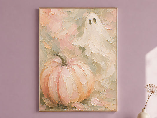 Framed pastel pink and sage green impasto ghost and pumpkin oil painting print hanging on a dusty mauve wall