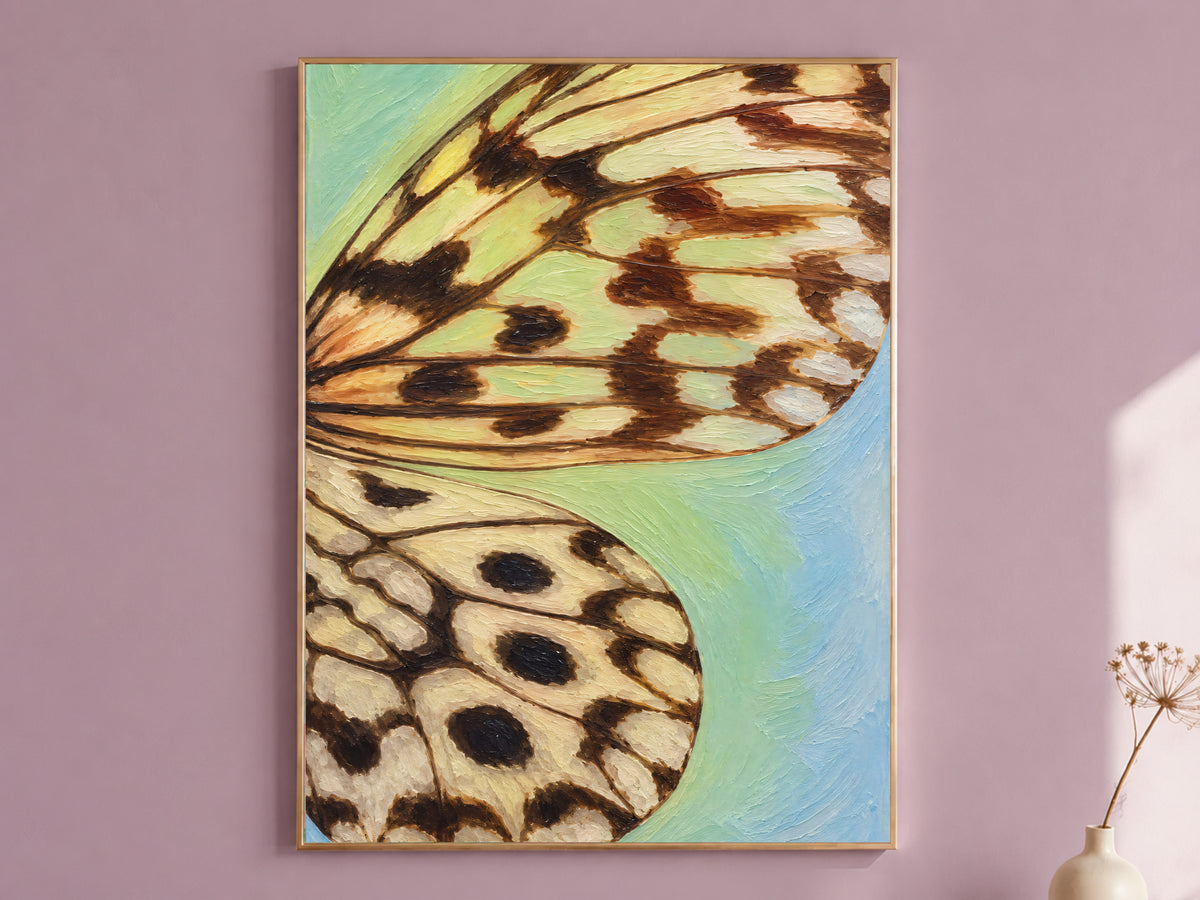 Framed teal and blue gradient butterfly wing wall art print on a mauve accent wall