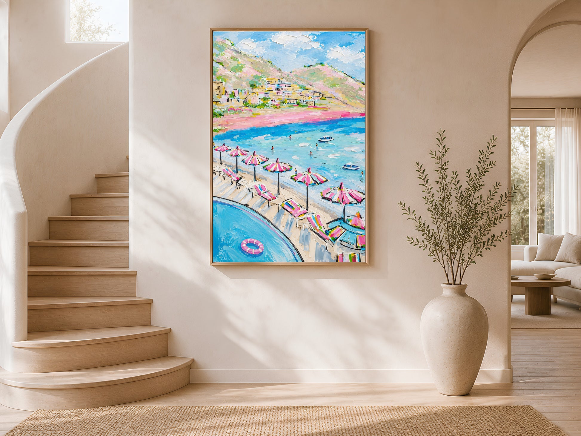 Positano Amalfi Coast impasto print in a wood frame displayed in a bright airy stairwell interior with white curved walls, warm natural light, and large ceramic vases
