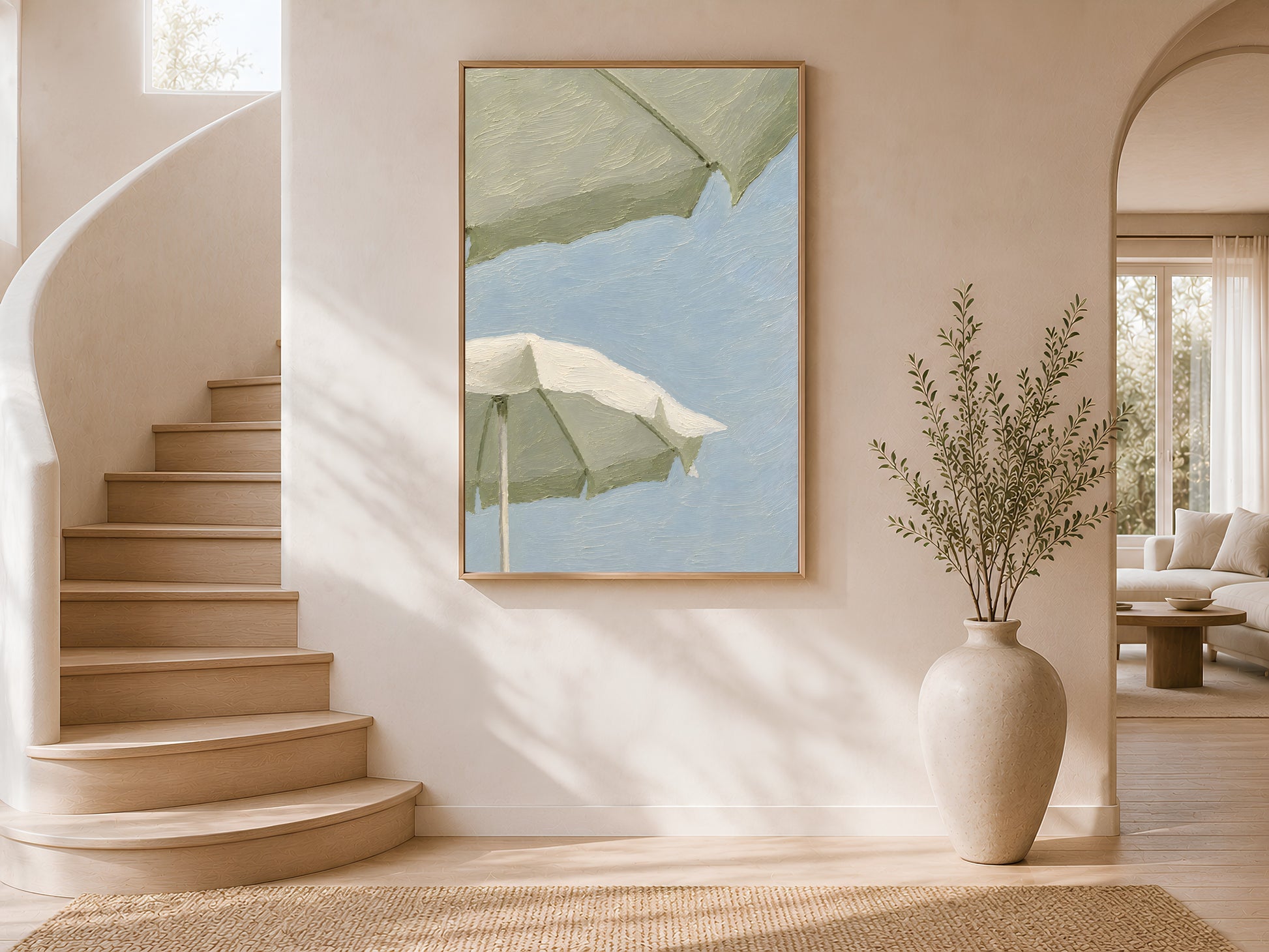 Sage green beach umbrella impasto print in a wood frame displayed in a bright airy stairwell interior with white curved walls, warm natural light, and large ceramic vases