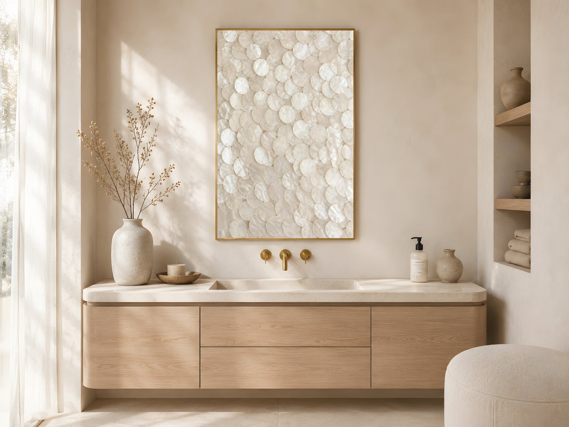 Capiz shell abstract wall art print in gold frame above wooden bathroom vanity with gold fixtures in warm minimalist Japandi bathroom
