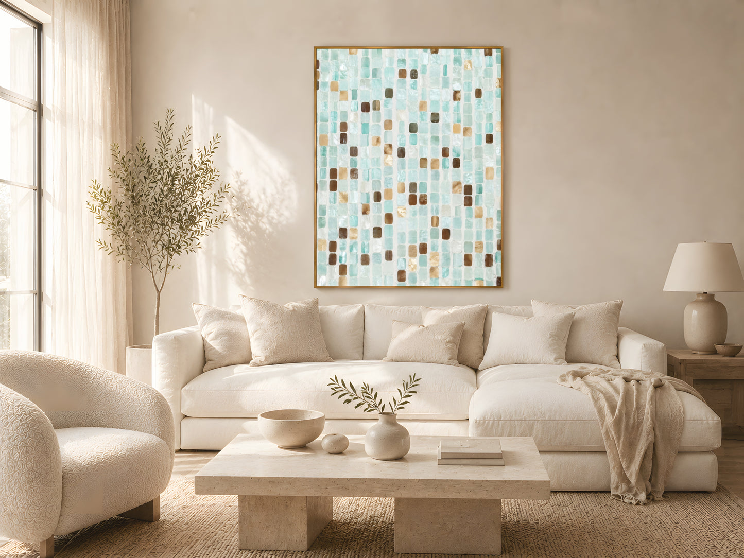 Teal mosaic tile abstract print in gold frame above cream sofa in warm Japandi living room with natural wood coffee table and soft natural light

