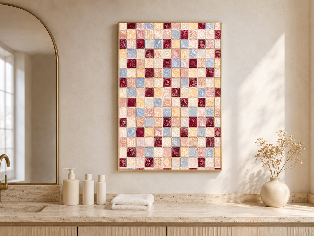 Pink blue mosaic wall art framed above a bathroom counter with a window and neutral towels