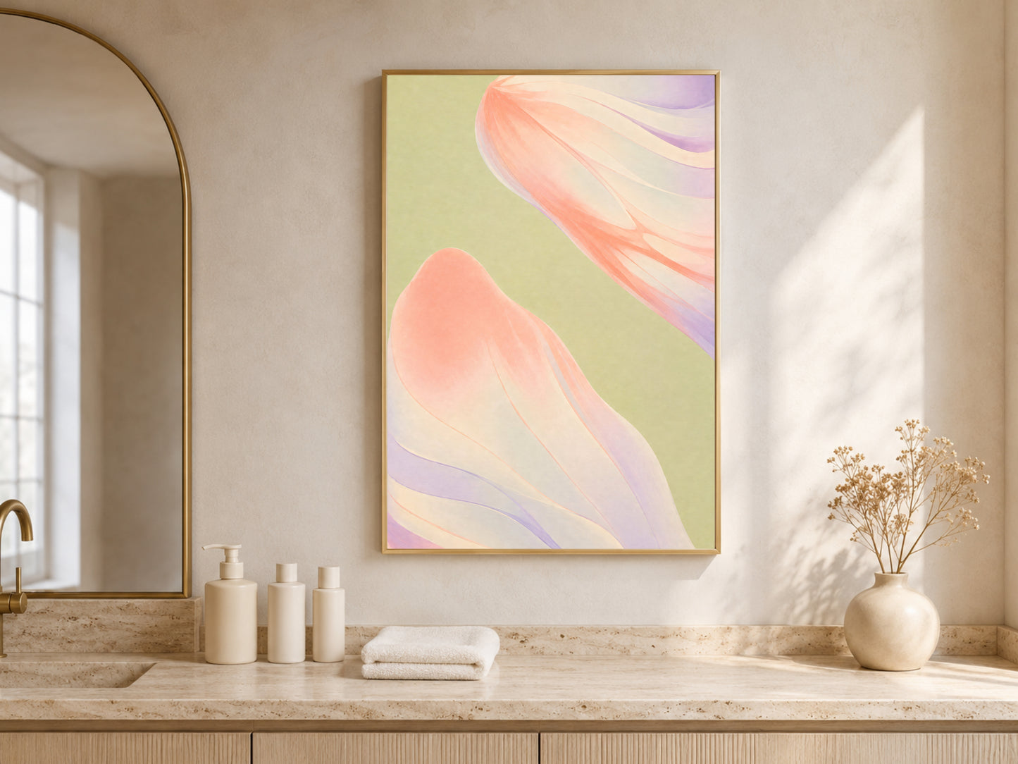 Sage green and coral abstract print framed above a bathroom vanity with warm wood cabinetry
