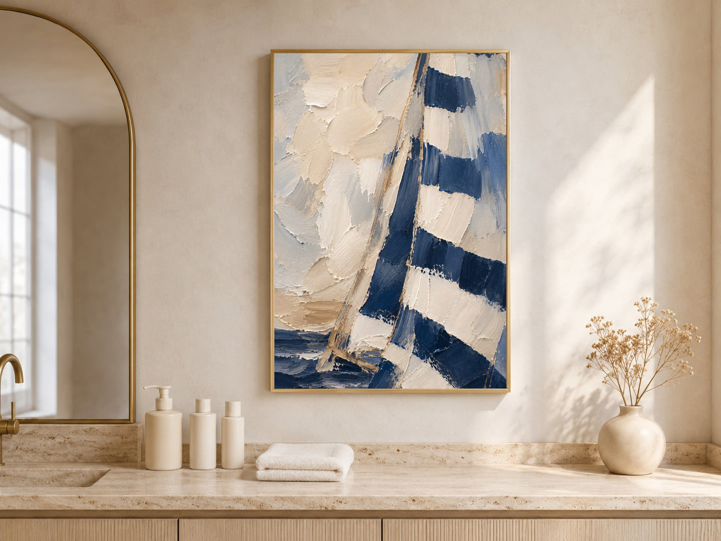 Navy sailboat wall art print framed above a console table in a mauve entryway