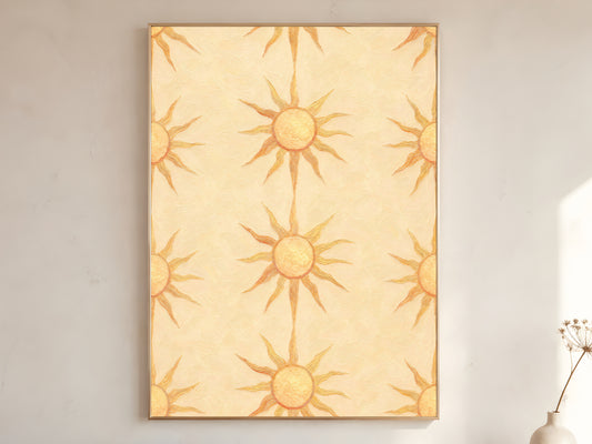 Boho sun wall art print in wooden frame on a cream wall, repeating butter yellow sunburst pattern, with a stoneware vase and dried branches.

