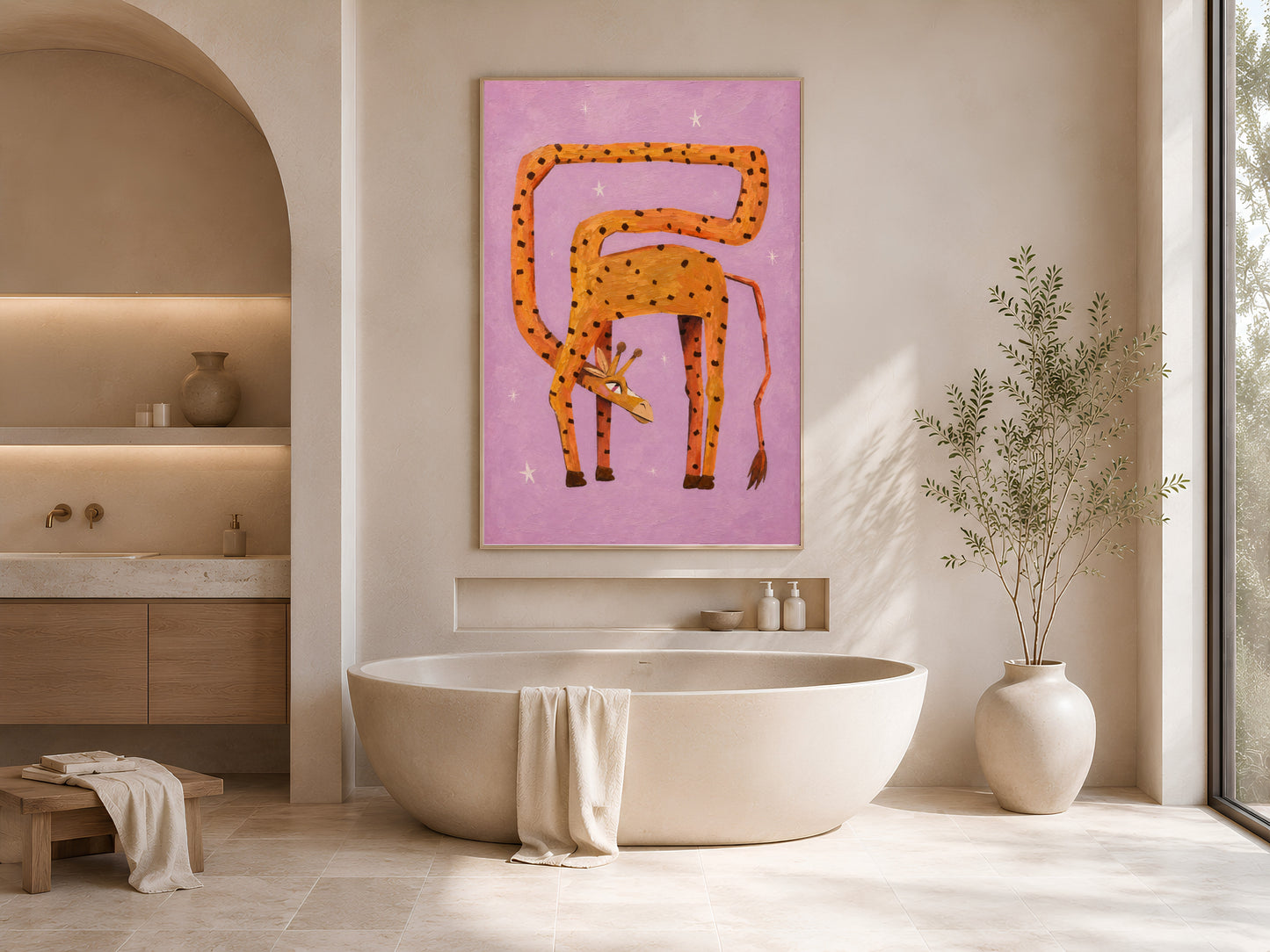 Framed whimsical giraffe print in a soft neutral bathroom with a freestanding bathtub, white towels, and dried botanicals
