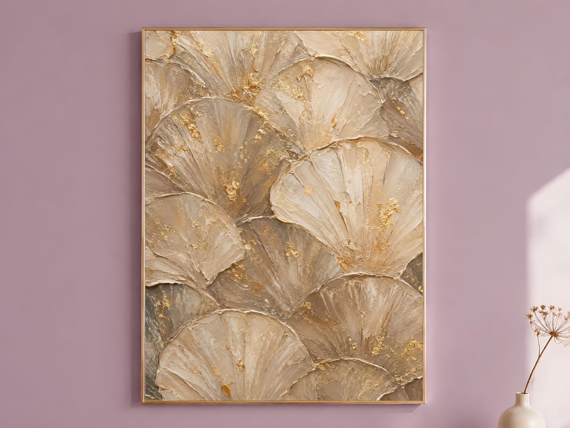 Ginkgo leaf wall art print in taupe and gold hanging in dusty mauve room
