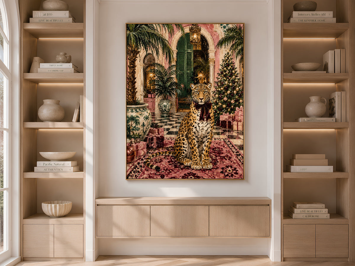Palm Beach Christmas print framed on built-in bookshelves styled with books and vases