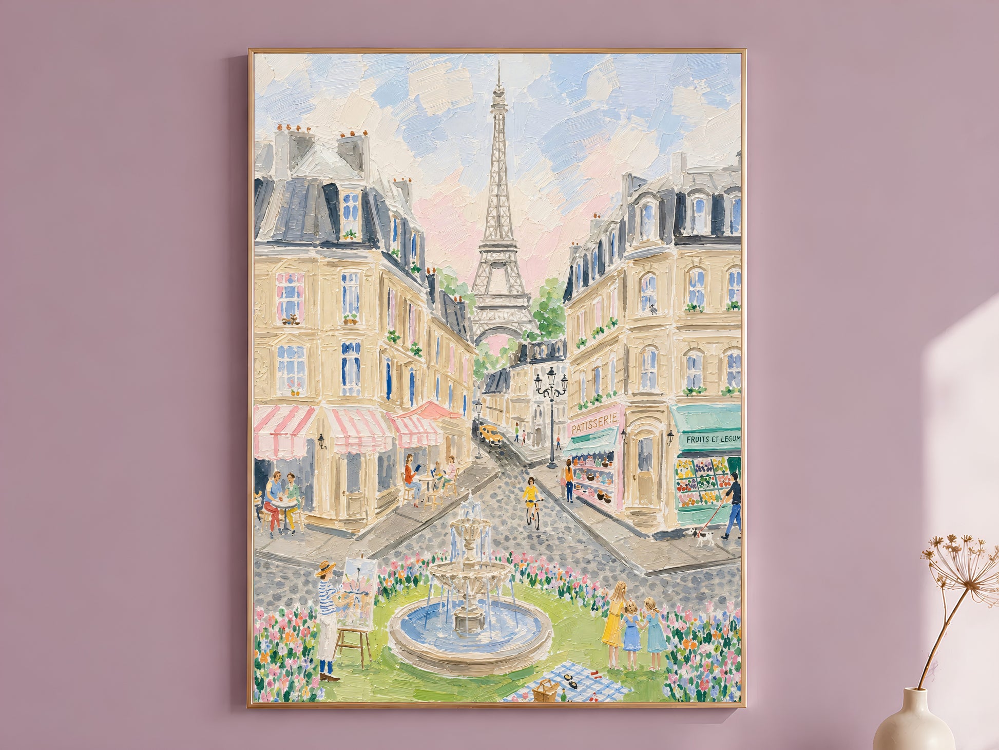Impasto oil painting Paris street scene wall art in a thin gold frame leaning against a dusty mauve wall with a dried allium stem in a cream vase beside it
