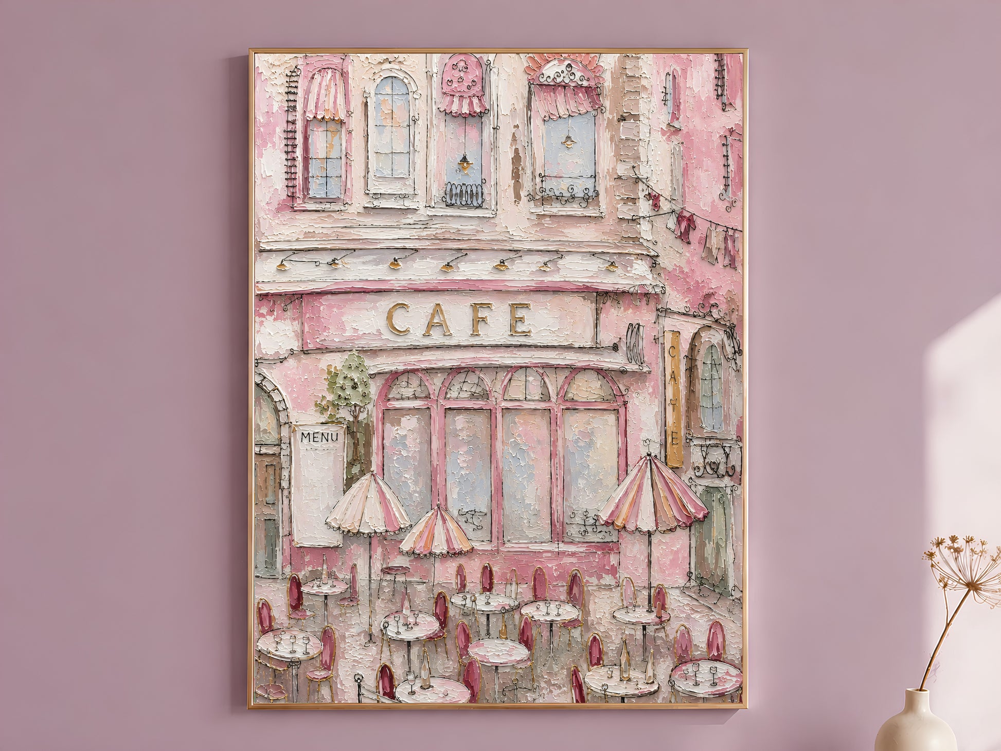 Parisian pink cafe wall art in a gold frame above a mauve wall, impasto painting of a storefront with striped awnings and bistro tables