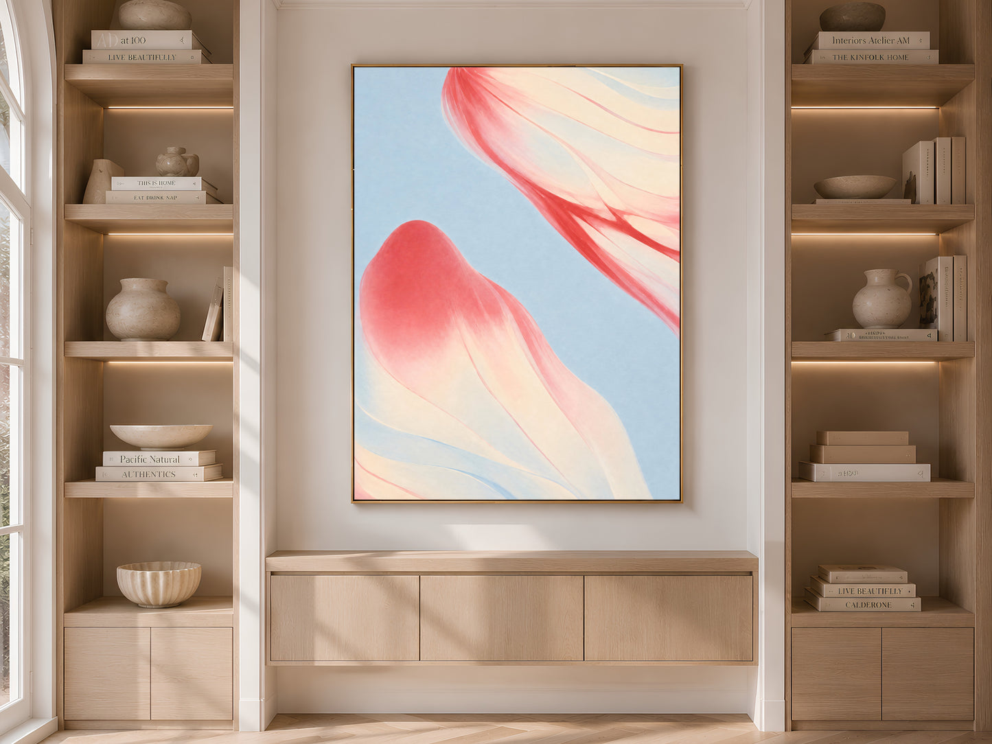 Coral and blue abstract art in built-in bookshelf, modern neutral living room decor