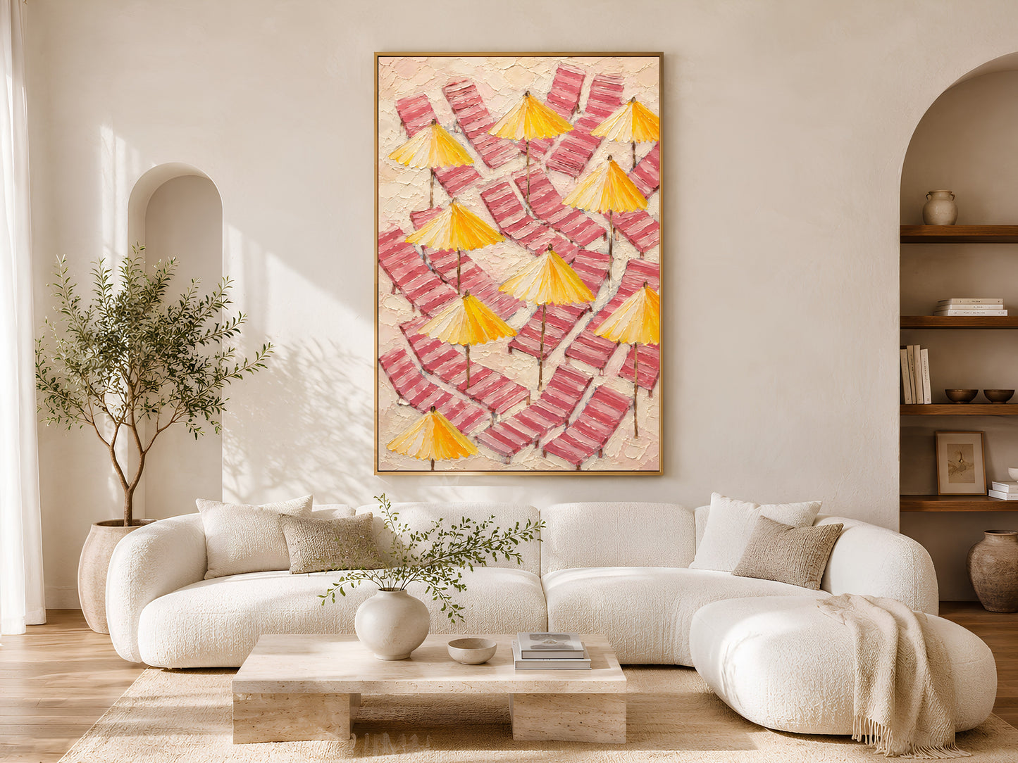 Coastal beach chair wall art printable displayed above a curved cream sofa in a luxury coastal living room with warm organic decor.