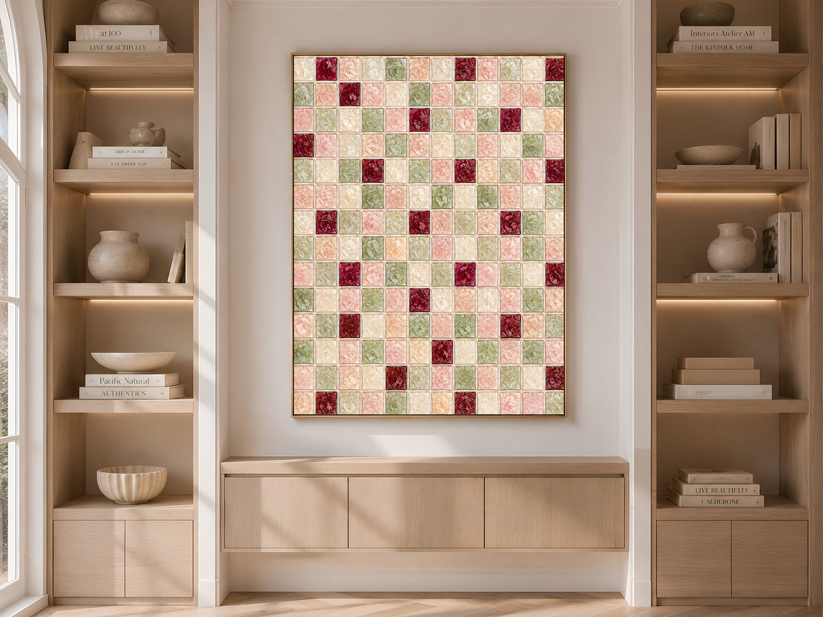 Sage green blush mosaic wall art framed on a built-in bookshelf with books and decor