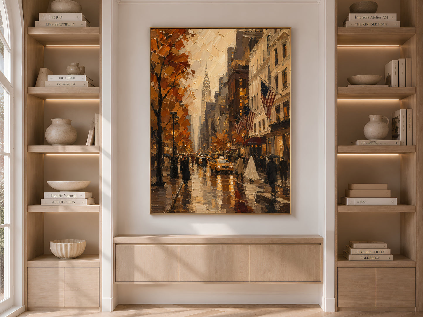 Built-in bookshelf nook with the New York City print centered between shelves of books and ceramic vases