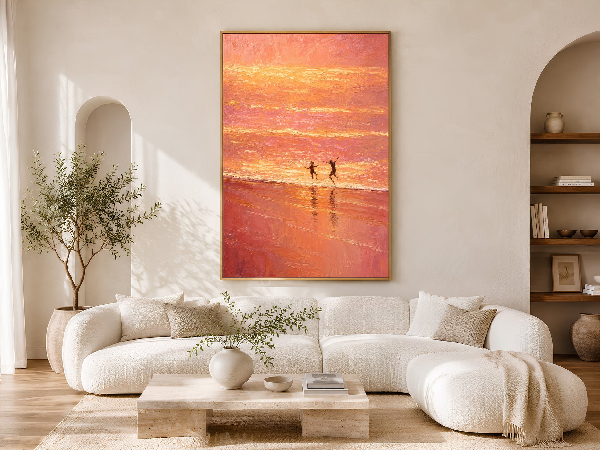 Sunset beach wall art printable hanging above a curved cream sofa in a luxury Mediterranean-inspired coastal living room.