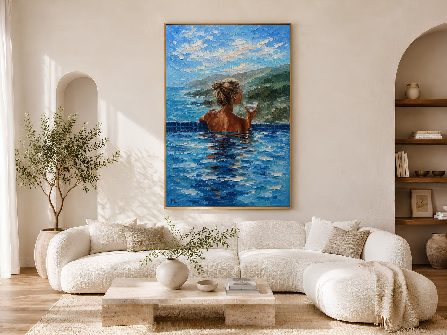Infinity pool woman impasto print in a gold frame above a cream curved sofa in a bright minimalist living room with arched wall detail and olive tree
