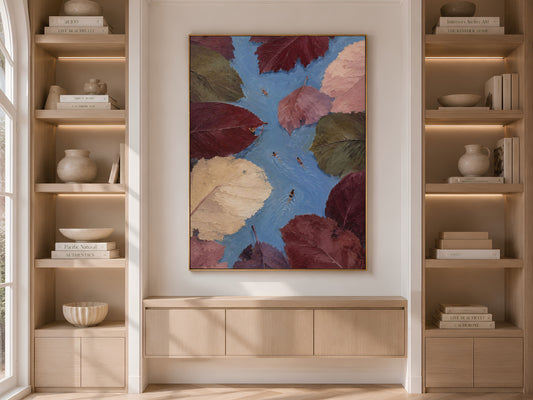 Surreal swimmer and autumn leaves print framed in wood built-in bookshelf nook
