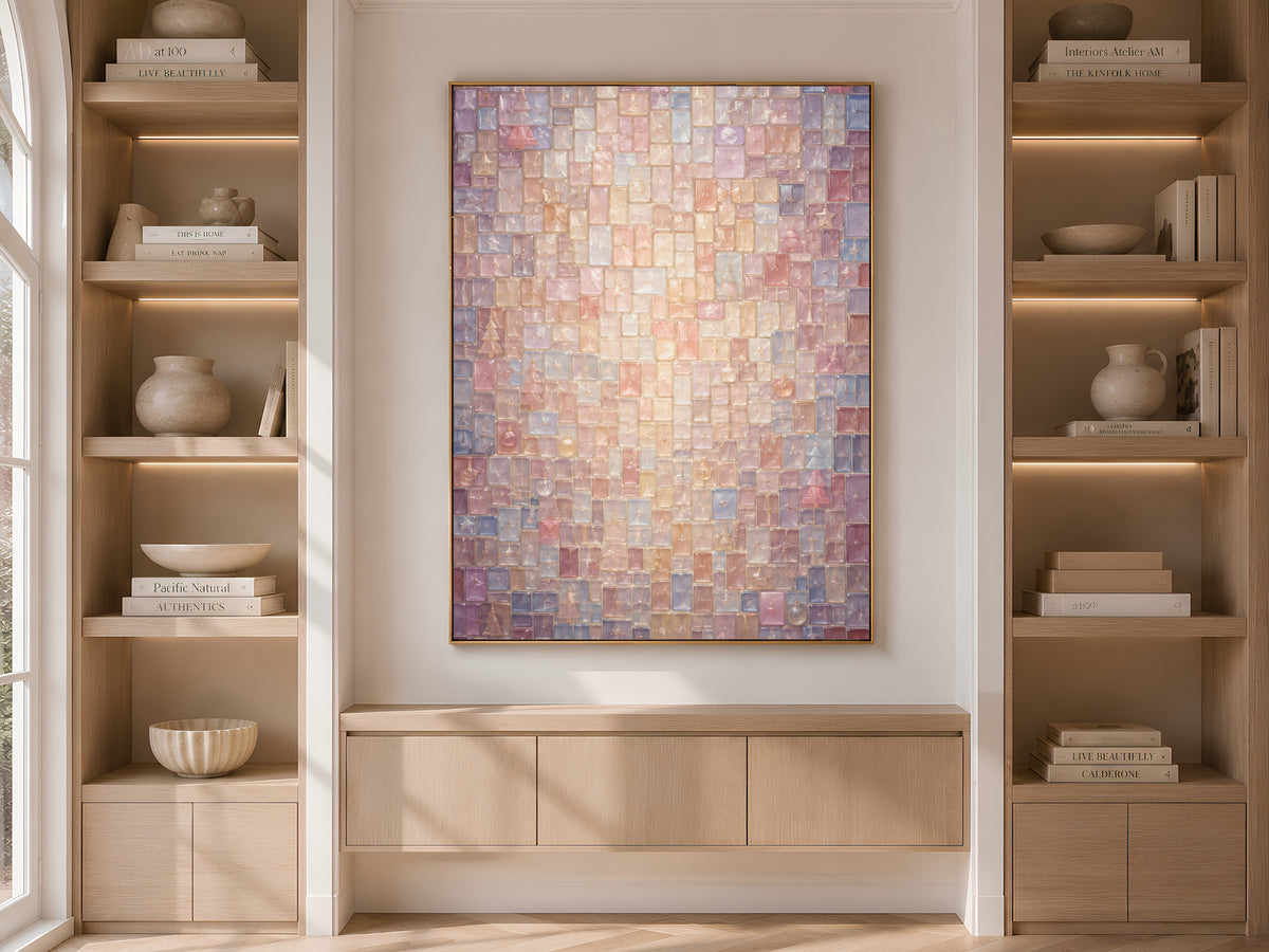 Pastel mosaic Christmas print framed and displayed in built-in wood shelving with books and decor