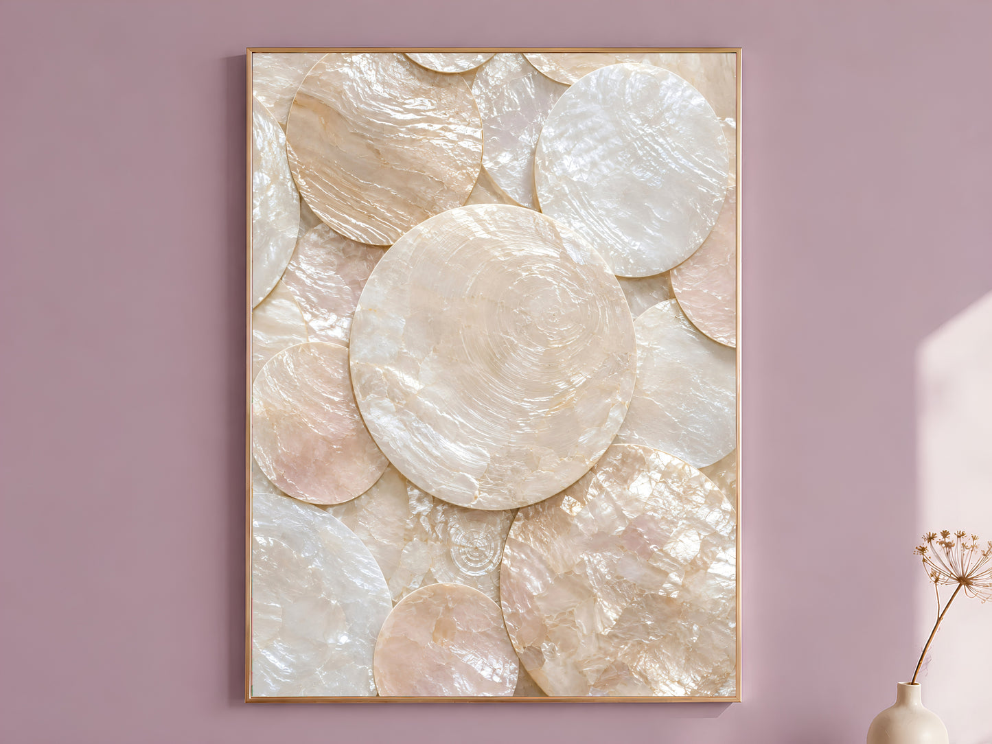Featured — Framed capiz shell wall art print in ivory and blush mother-of-pearl mosaic hanging on a mauve wall
