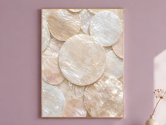 Featured — Framed capiz shell wall art print in ivory and blush mother-of-pearl mosaic hanging on a mauve wall
