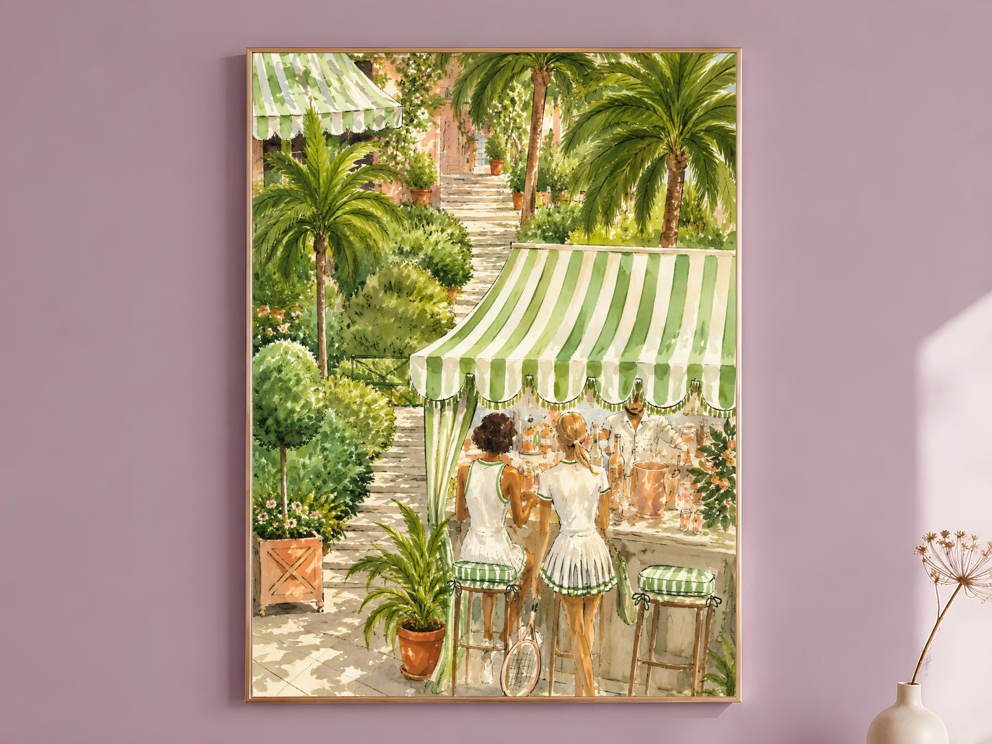 Tennis club wall art print in a gold frame hanging on a dusty mauve wall beside a vase of dried flowers.
