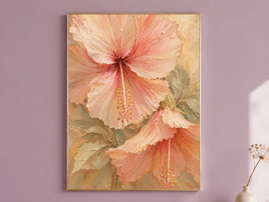 Pastel hibiscus flower print in a gold frame hanging on a dusty mauve wall