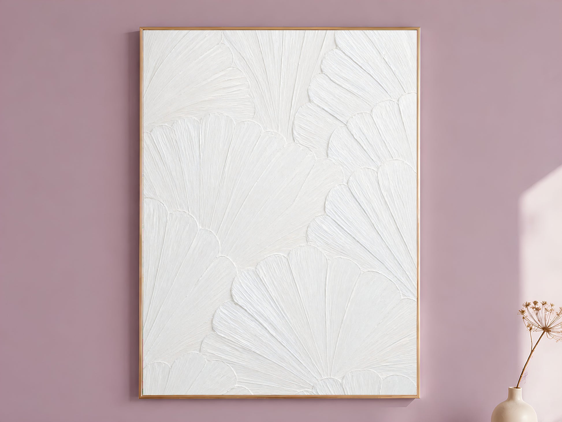 White plaster scallop mosaic print in a thin gold frame against a mauve wall with dried flowers, wabi sabi wall art
