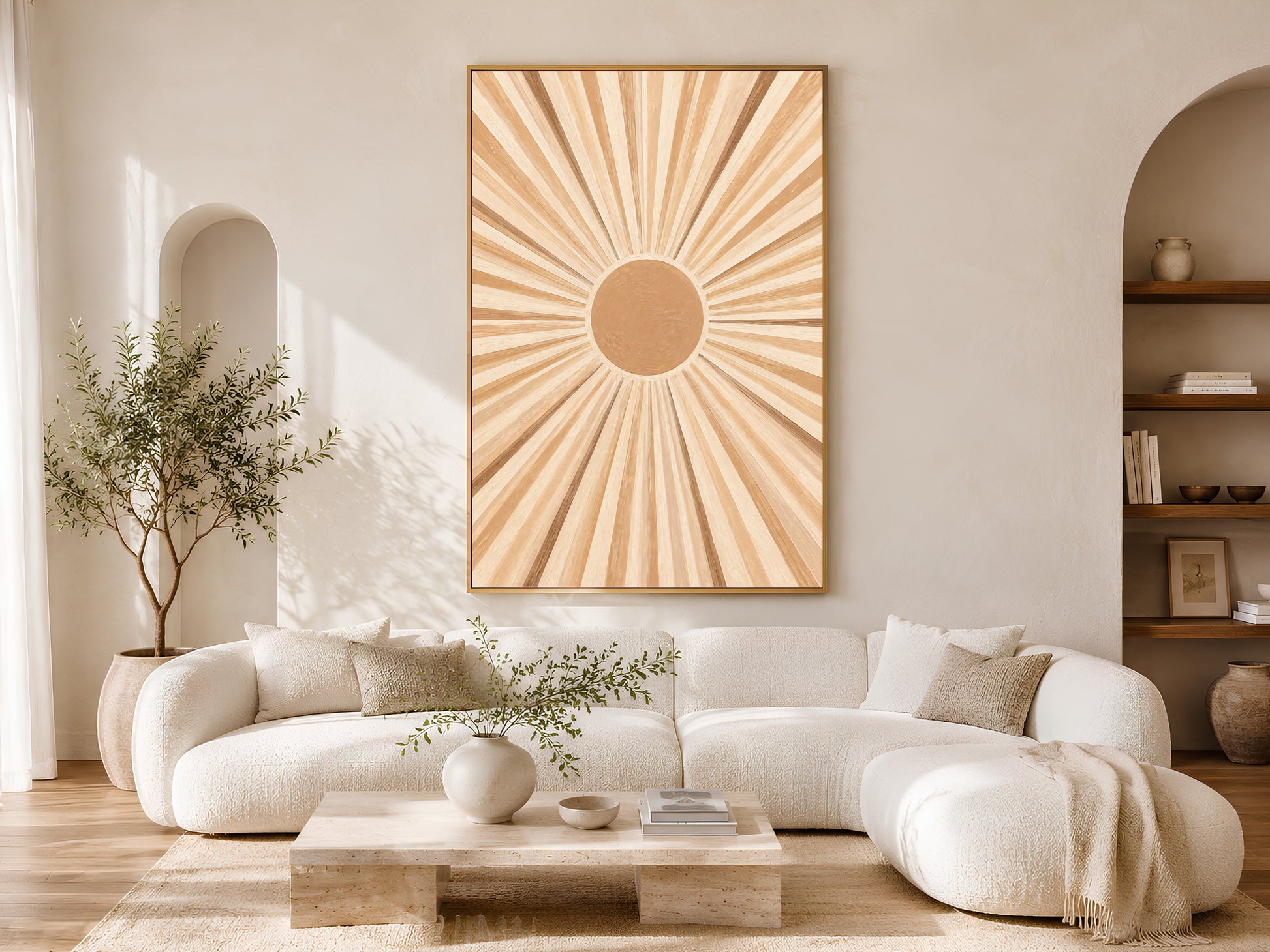 Framed impasto sunburst wall art on warm white wall in minimal living room with curved cream sofa and tall vase
