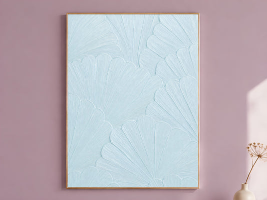Powder blue scallop mosaic print in a thin gold frame against a mauve wall with dried flowers, coastal wall art