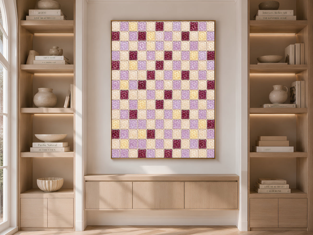 Framed purple and burgundy mosaic print displayed on a built-in bookshelf with books and decor