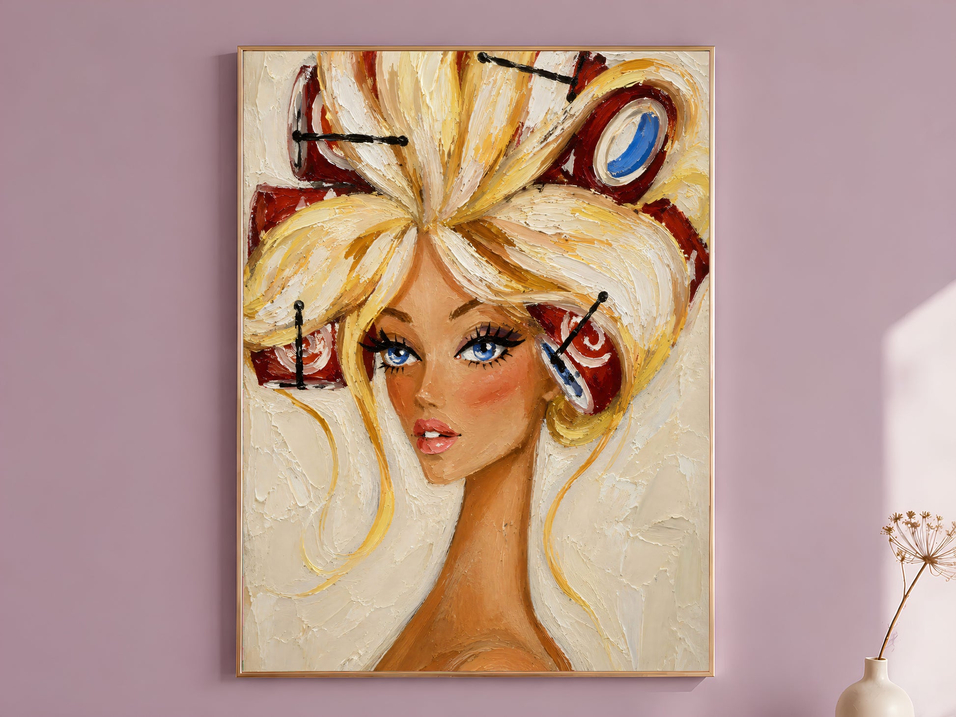 Vintage hair rollers portrait wall art print in a gold frame hanging on a dusty mauve wall beside a vase of dried flowers.
