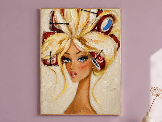 Vintage hair rollers portrait wall art print in a gold frame hanging on a dusty mauve wall beside a vase of dried flowers.
