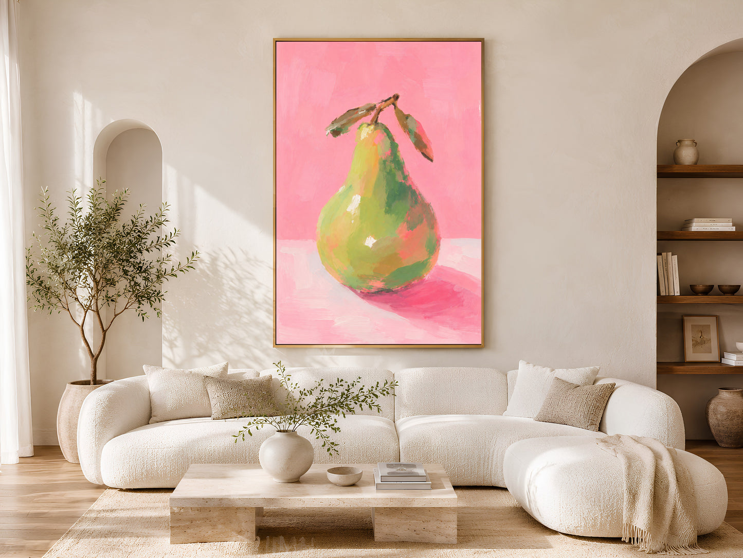 Framed impasto green pear wall art on warm white wall in minimal living room with curved cream sofa and coffee table
