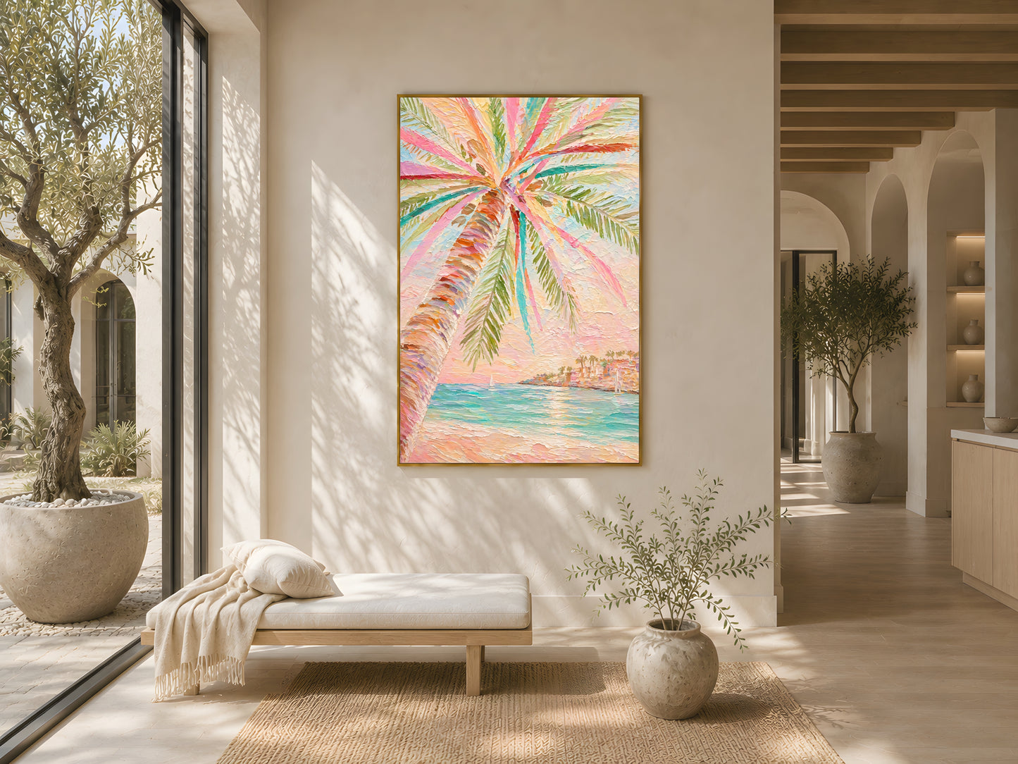 Large colorful palm tree impasto wall art in gold frame on warm white wall in bright Mediterranean living room with arched doorway and olive tree
