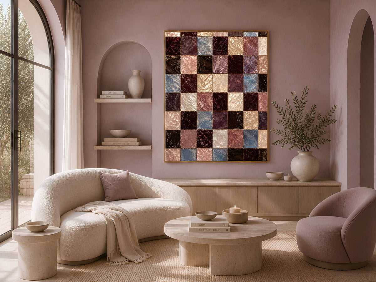 Dark academia tile print framed above a curved boucle sofa in a warm neutral living room