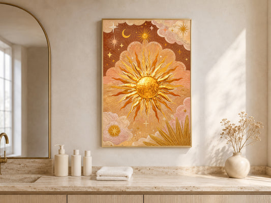 The Sun tarot wall art framed above a marble bathroom counter, warm gold mystical celestial print
