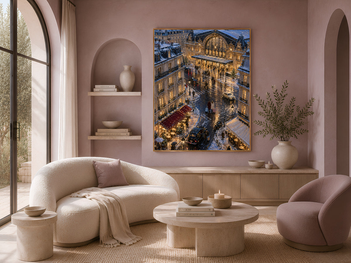 Paris street art framed above cream armchairs in sunlit living room