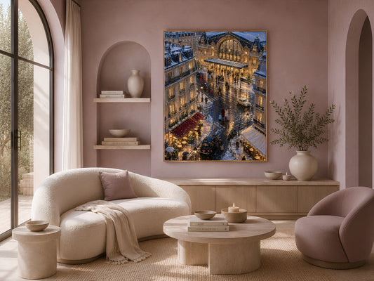 Paris street art framed above cream armchairs in sunlit living room