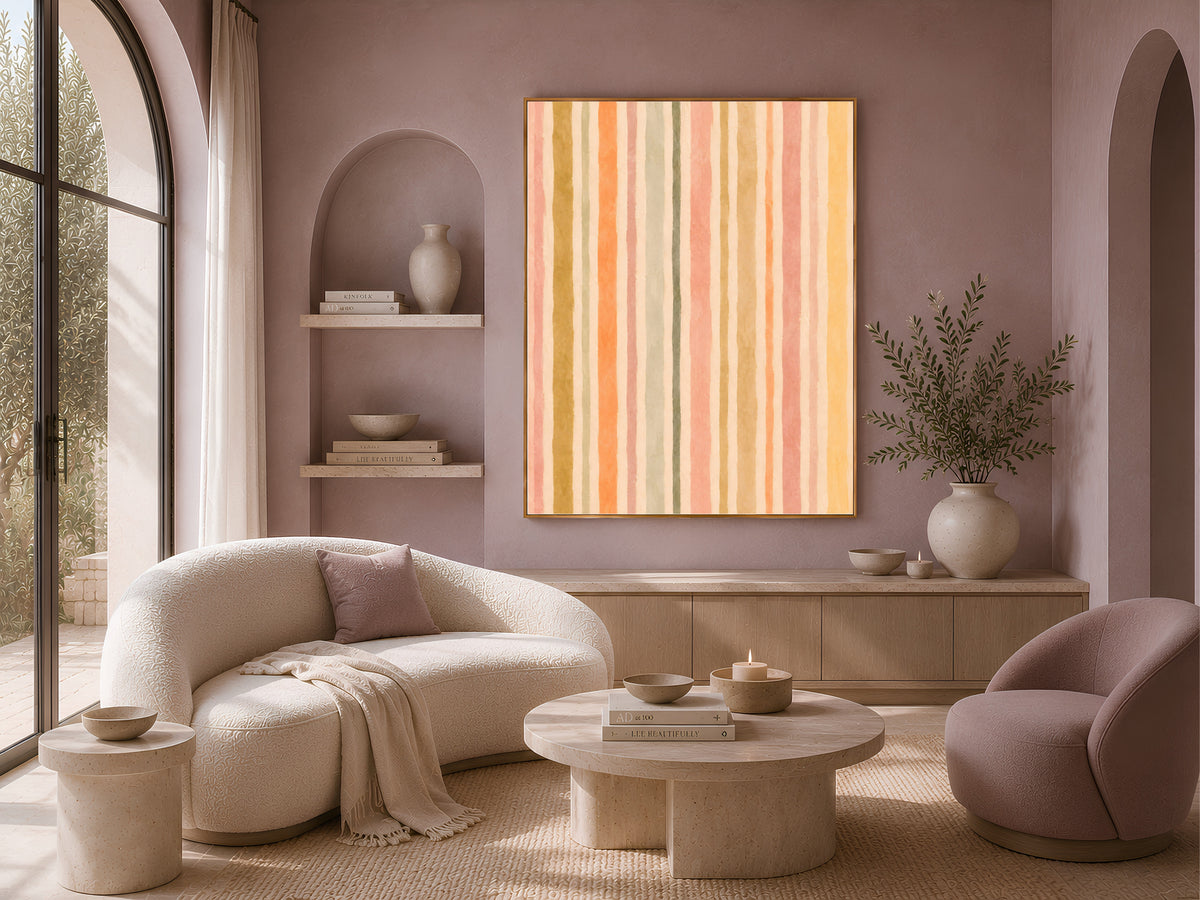 Pastel stripe wall art above a neutral boucle living room sofa