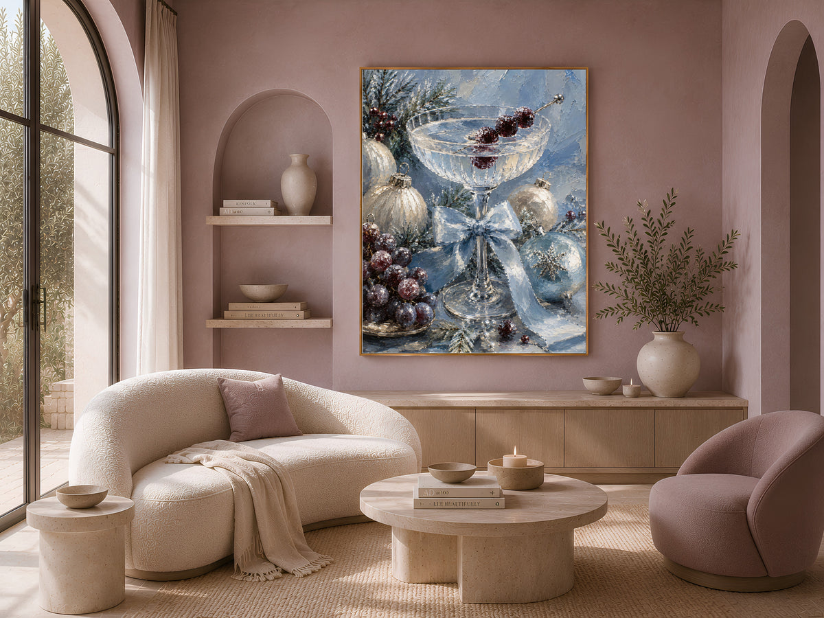 Christmas cocktail print framed above a curved boucle sofa in a warm neutral living room