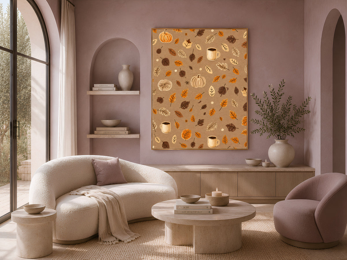 Cozy autumn pattern wall art with pumpkins and leaves above a neutral living room sofa